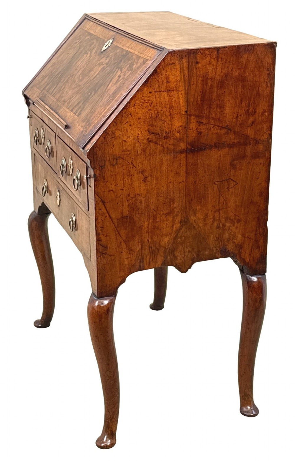 An early 18th-century walnut bureau on legs featuring a slant-front lid, small drawers with brass teardrop handles, and cabriole legs. View III