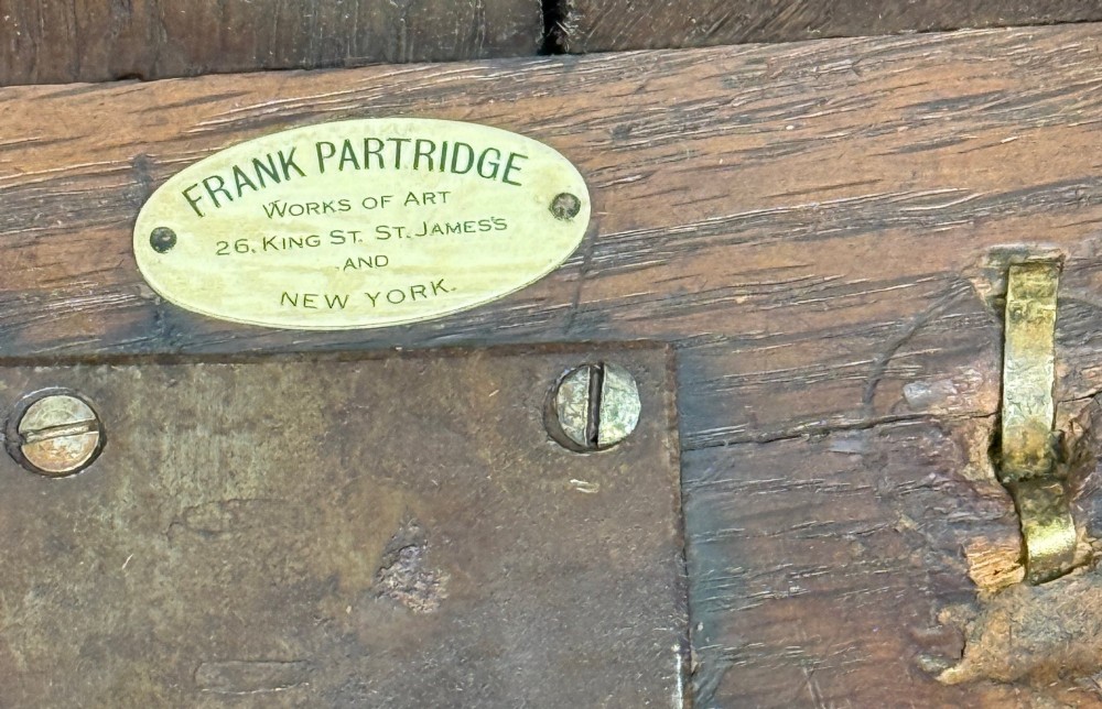 An early 18th-century walnut bureau on legs featuring a slant-front lid, small drawers with brass teardrop handles, and cabriole legs. View XI