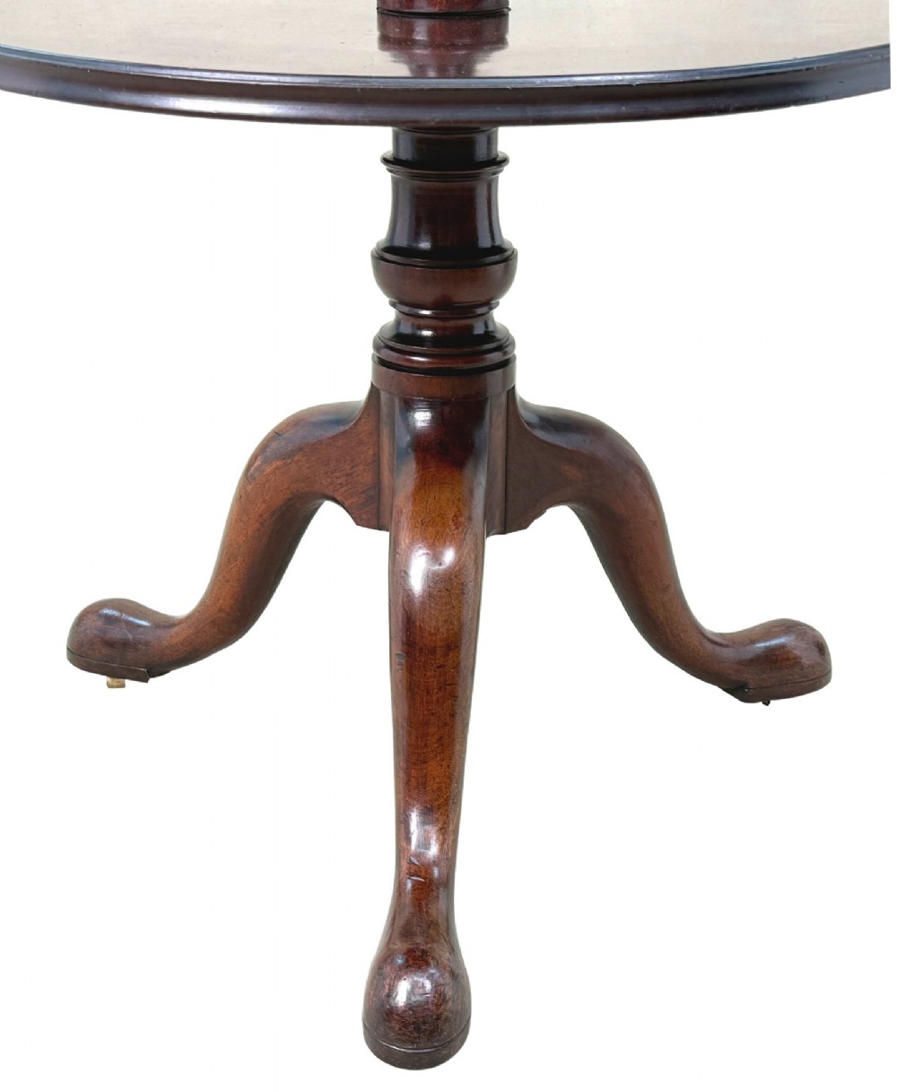 An 18th-century Georgian mahogany dumbwaiter featuring three graduated circular dished tiers supported by a turned central column and a tripod base with pad feet. View VIII