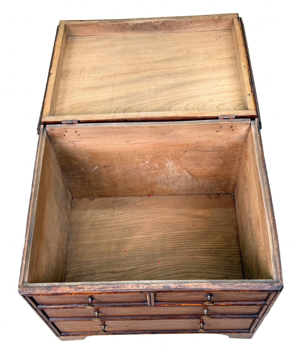 An 18th-century warm brown elm close stool designed as a small Georgian chest of drawers with bracket feet and brass handles. View VIII
