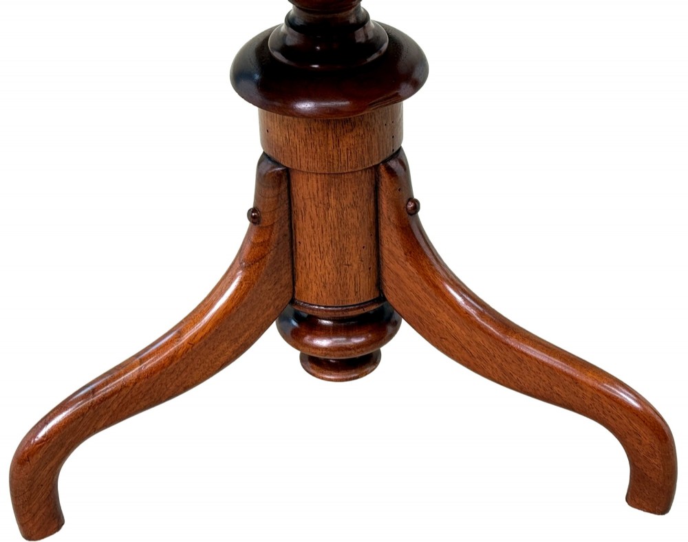 A 19th-century Victorian burr walnut circular occasional table with a central turned column, three-section spindle gallery tier, and a tripod base. View VI