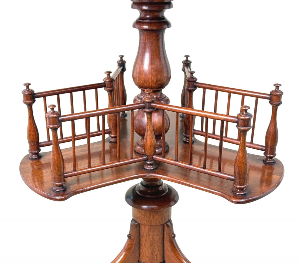 A 19th-century Victorian burr walnut circular occasional table with a central turned column, three-section spindle gallery tier, and a tripod base. View VIII