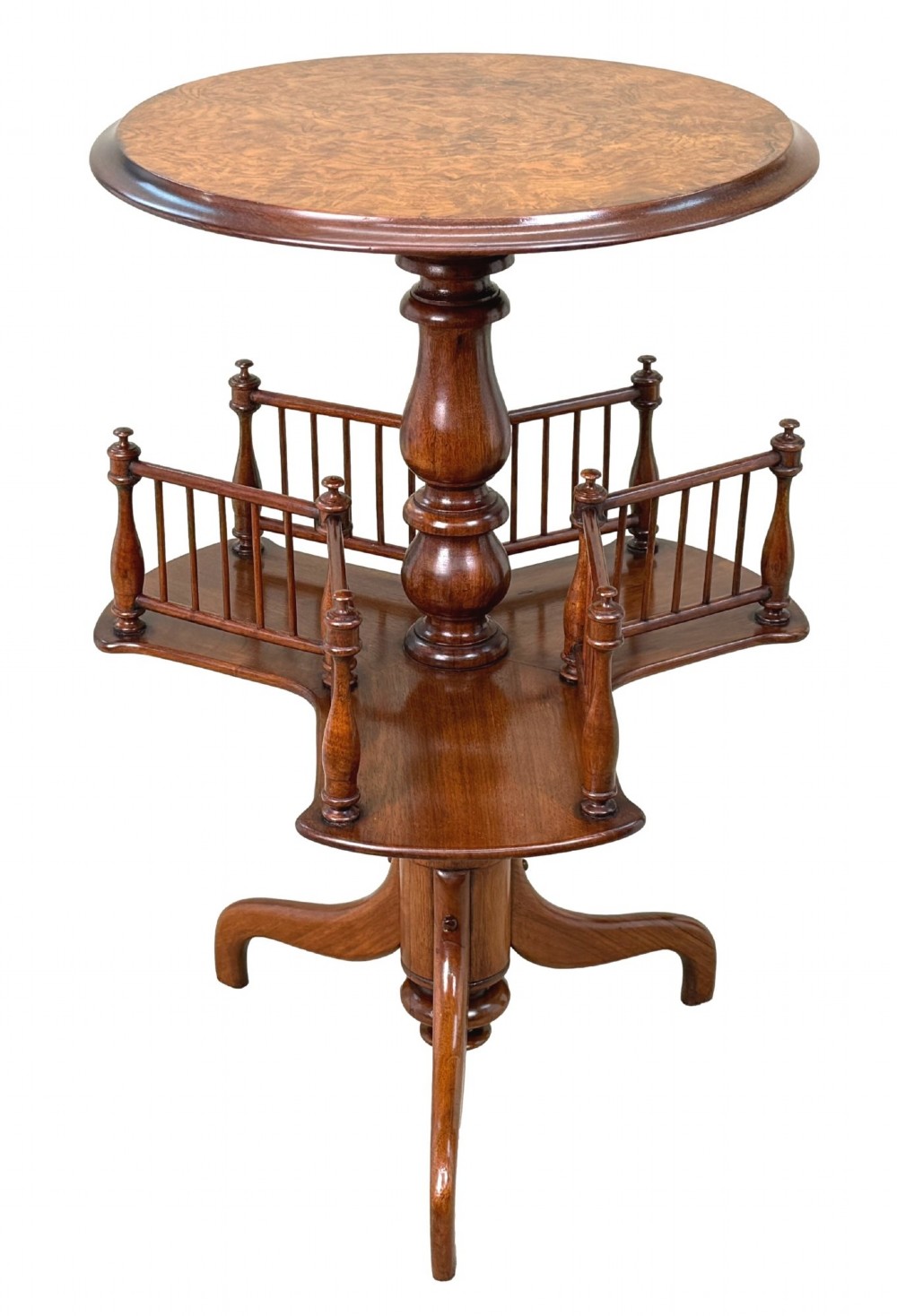 A 19th-century Victorian burr walnut circular occasional table with a central turned column, three-section spindle gallery tier, and a tripod base. View XII