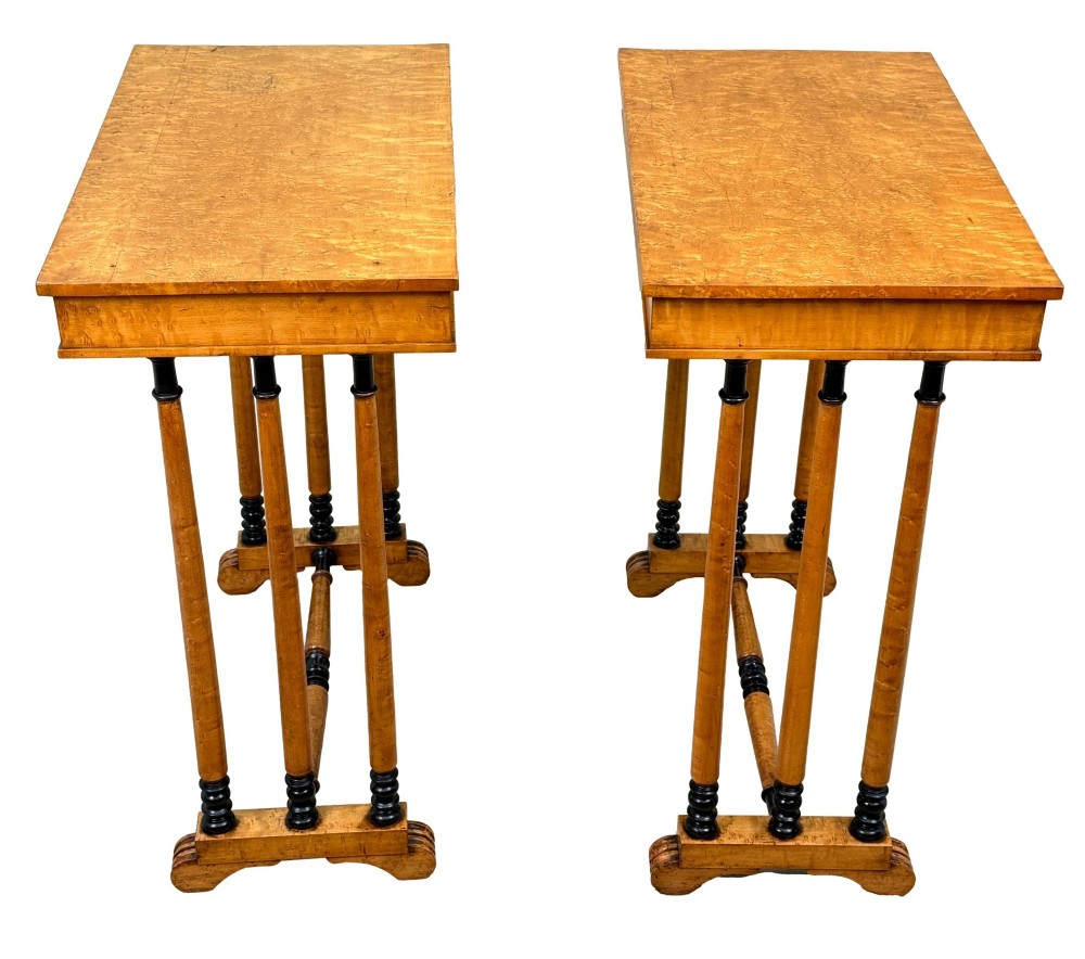 A pair of Regency birdseye maple occasional tables featuring quadrupled slender turned legs with ebonised details and a stretcher base. View III