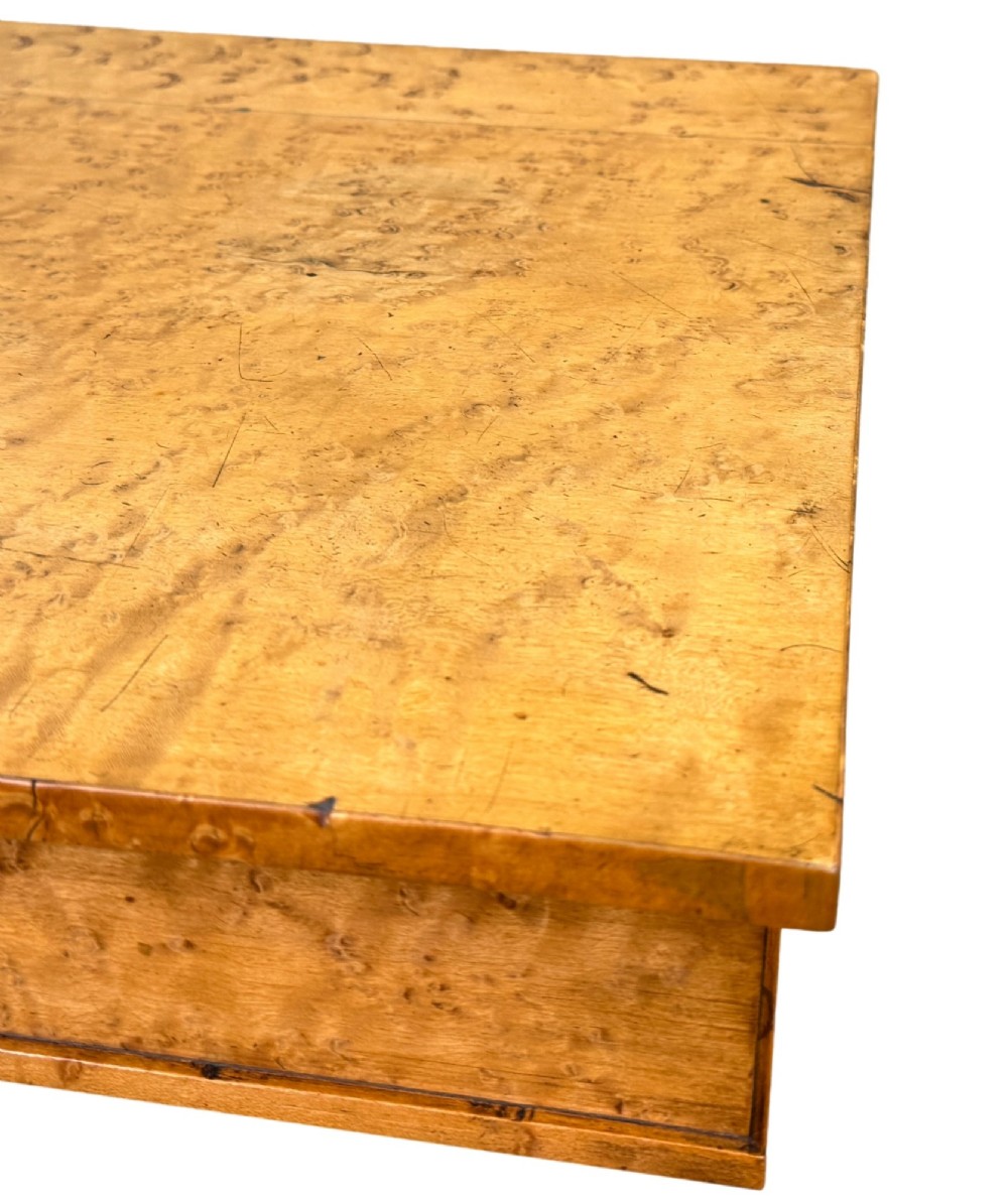 A pair of Regency birdseye maple occasional tables featuring quadrupled slender turned legs with ebonised details and a stretcher base. View IX