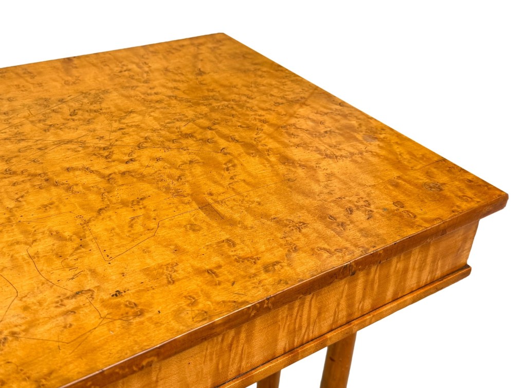 A pair of Regency birdseye maple occasional tables featuring quadrupled slender turned legs with ebonised details and a stretcher base. View XI