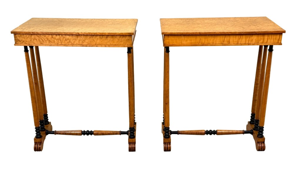 A pair of Regency birdseye maple occasional tables featuring quadrupled slender turned legs with ebonised details and a stretcher base. View XV