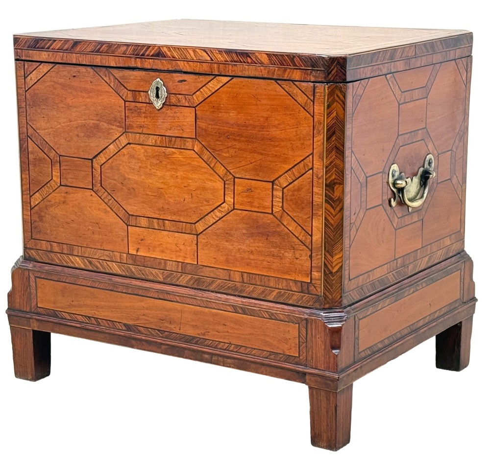 An 18th-century George II satinwood and kingwood parquetry box cellarette with brass carrying handles on square legs.