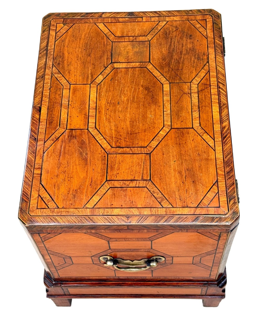 An 18th-century George II satinwood and kingwood parquetry box cellarette with brass carrying handles on square legs. View II