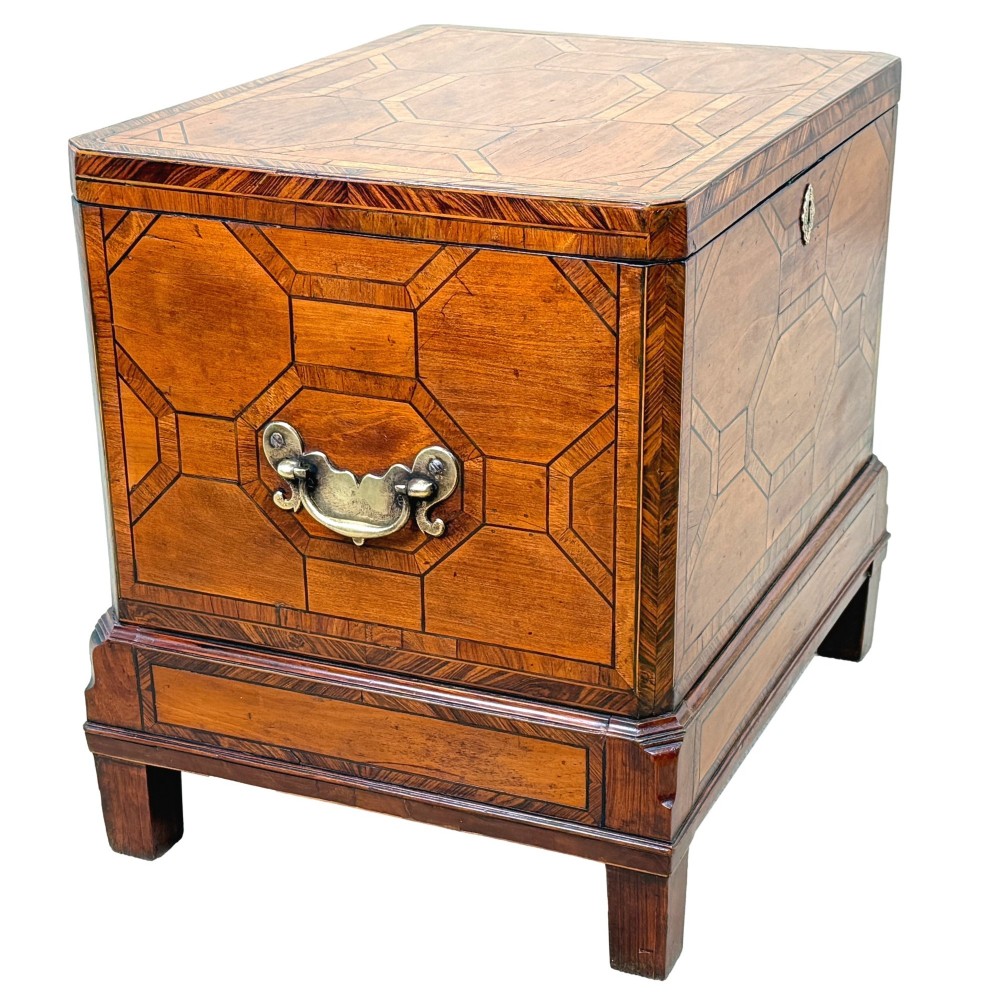 An 18th-century George II satinwood and kingwood parquetry box cellarette with brass carrying handles on square legs. View IX