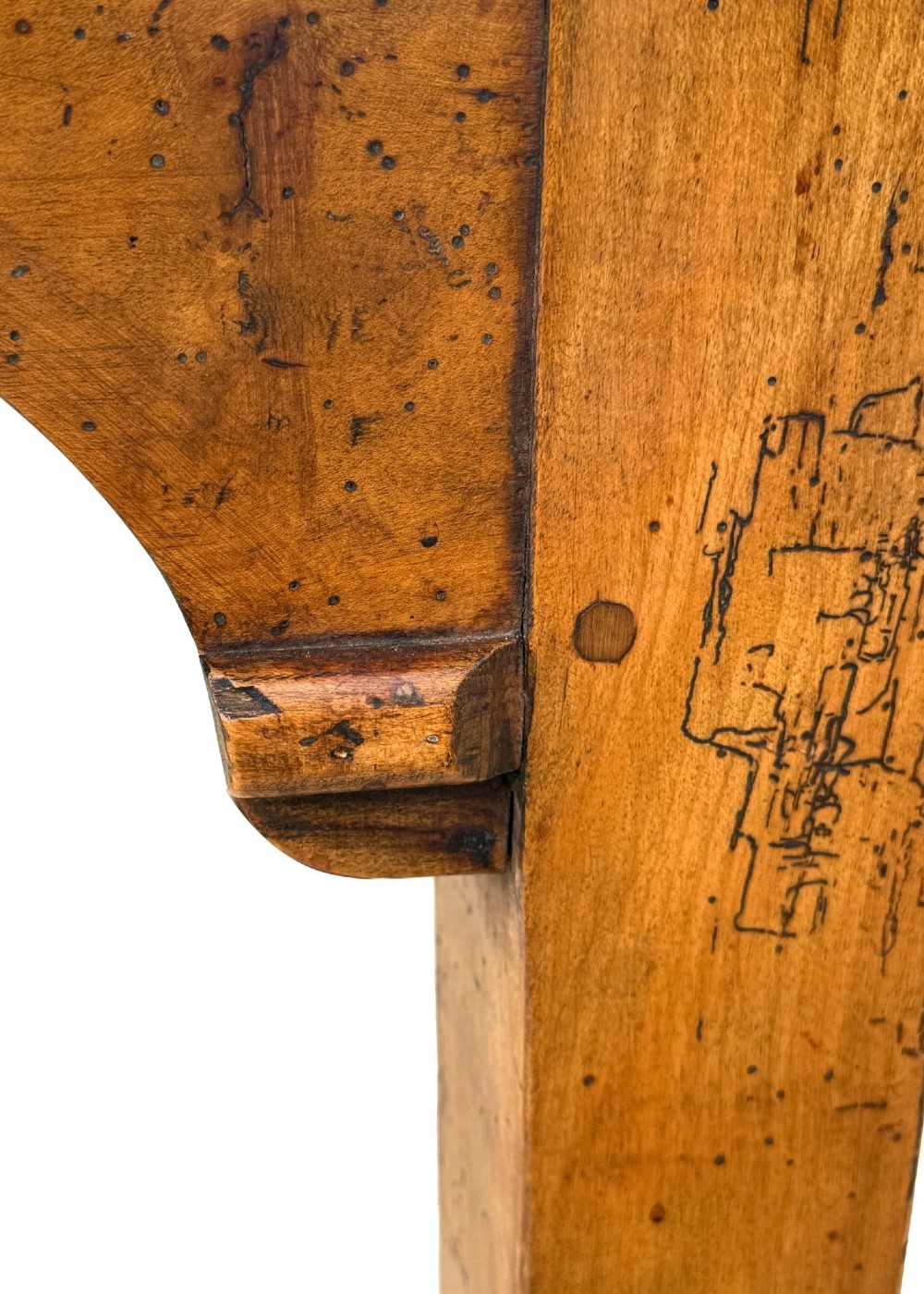 An early 19th-century French Provincial sycamore farmhouse dining table featuring a light wood plank top and tapered square legs. View V