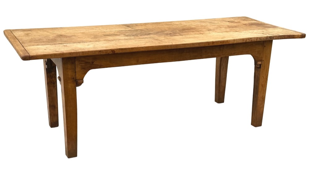 An early 19th-century French Provincial sycamore farmhouse dining table featuring a light wood plank top and tapered square legs. View VII
