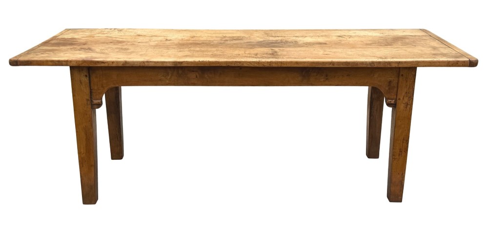 An early 19th-century French Provincial sycamore farmhouse dining table featuring a light wood plank top and tapered square legs. View XIV