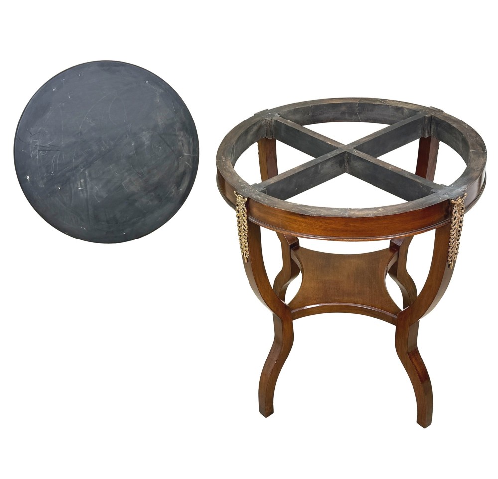 A late nineteenth-century circular mahogany occasional table featuring a specimen marble top, outcurving legs with gilt mounts, and a lower undertier. View X