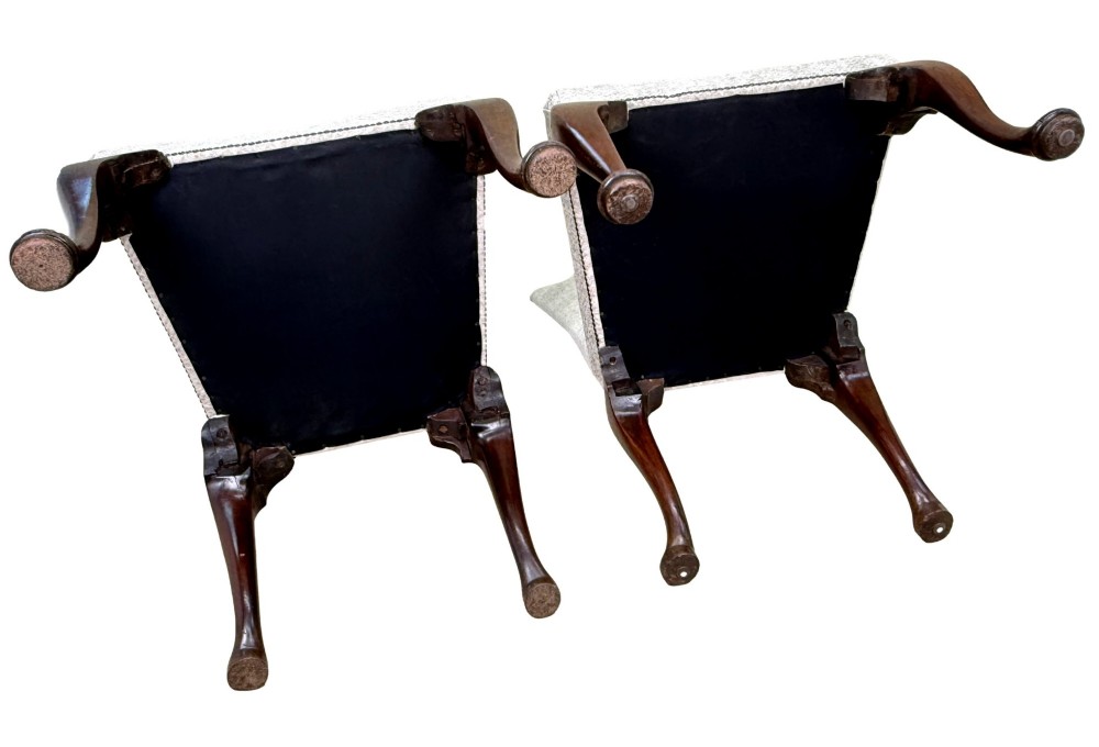 A pair of Georgian walnut side chairs featuring cream textured upholstery and carved cabriole legs ending in pad feet. View XII