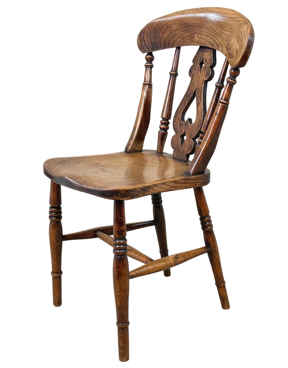 A set of six Victorian wooden Windsor dining chairs featuring shaped crest rails, pierced back splats, contoured saddle seats, and turned legs. View VIII