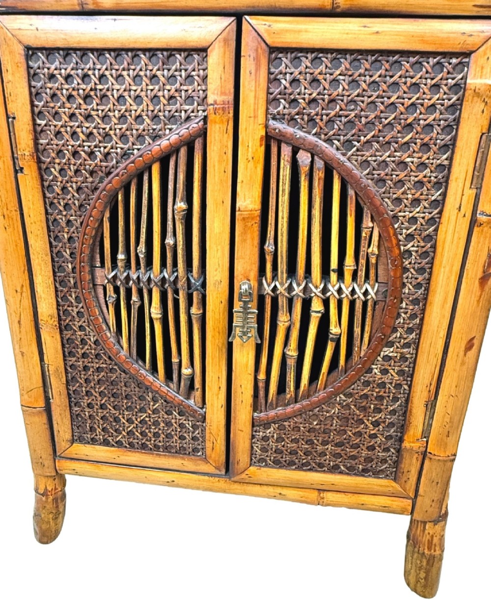A pair of late nineteenth-century miniature bamboo tabletop cupboards featuring woven cane panels and central circular bamboo slat detail on the twin doors. View III