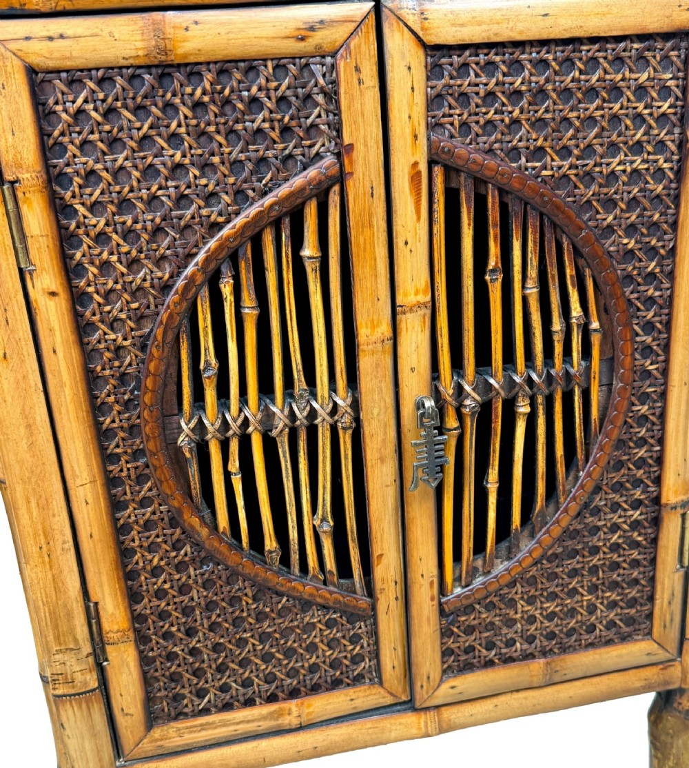 A pair of late nineteenth-century miniature bamboo tabletop cupboards featuring woven cane panels and central circular bamboo slat detail on the twin doors. View VII