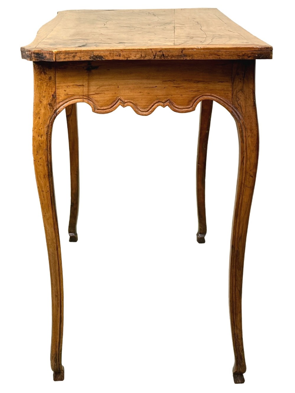 A late 18th-century French Provincial cherry wood side table featuring cabriole legs, a scalloped apron, and a single drawer with a brass escutcheon. View VI