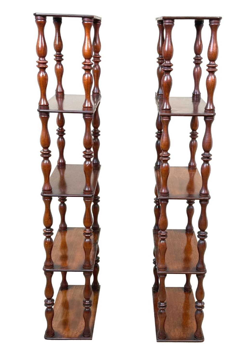 A pair of tall mid-19th-century mahogany wall-hanging shelves featuring five open tiers supported by turned spindles. View II