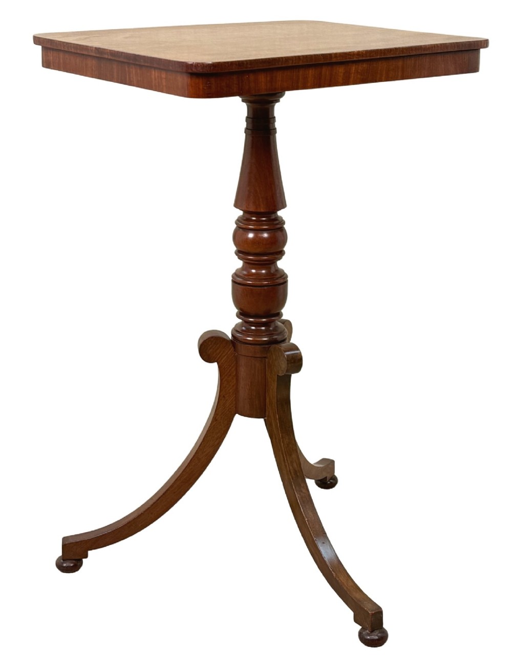 A Regency period mahogany wine table with a rectangular top, a turned central pedestal column, and three splayed legs ending in ball feet. View IX
