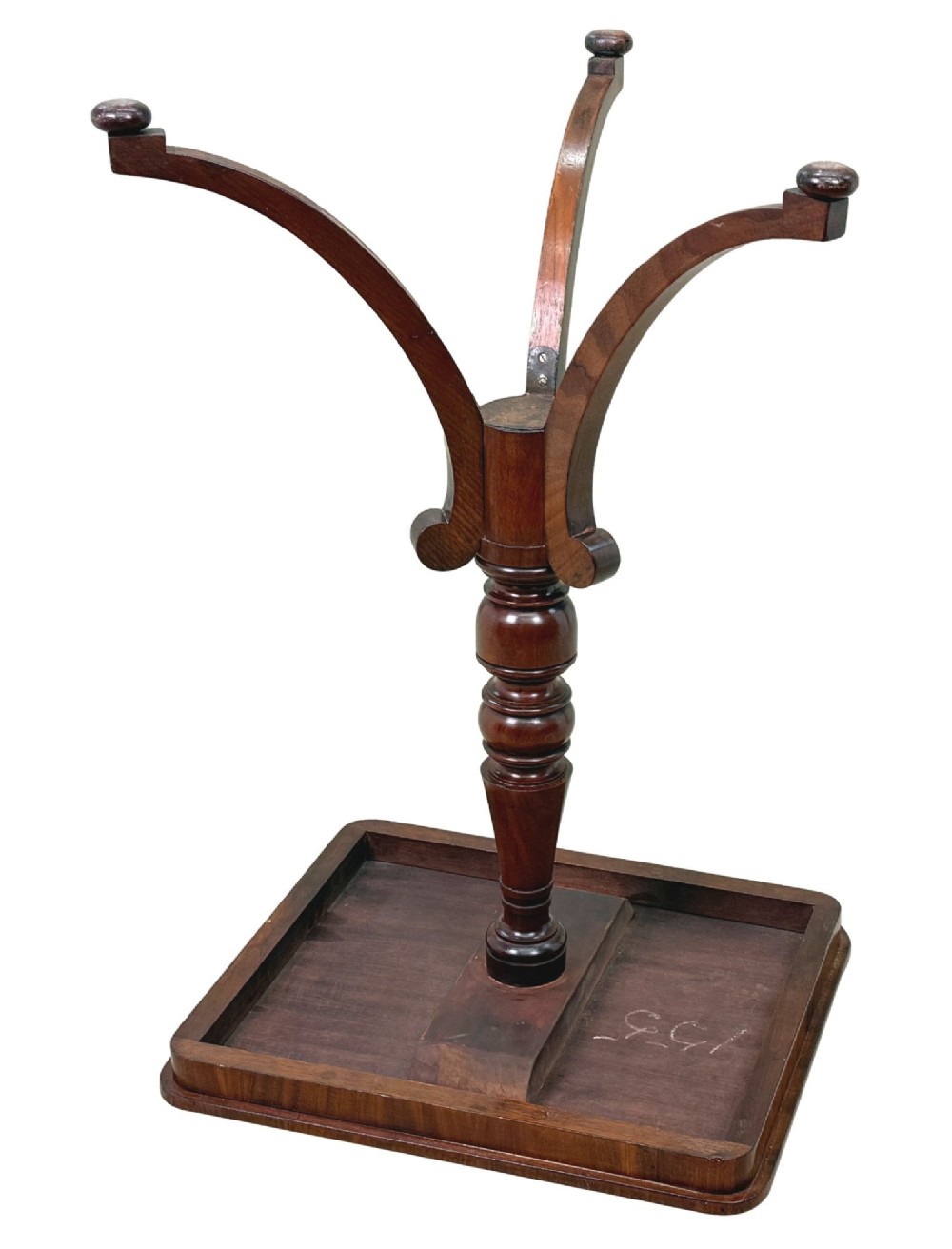A Regency period mahogany wine table with a rectangular top, a turned central pedestal column, and three splayed legs ending in ball feet. View X