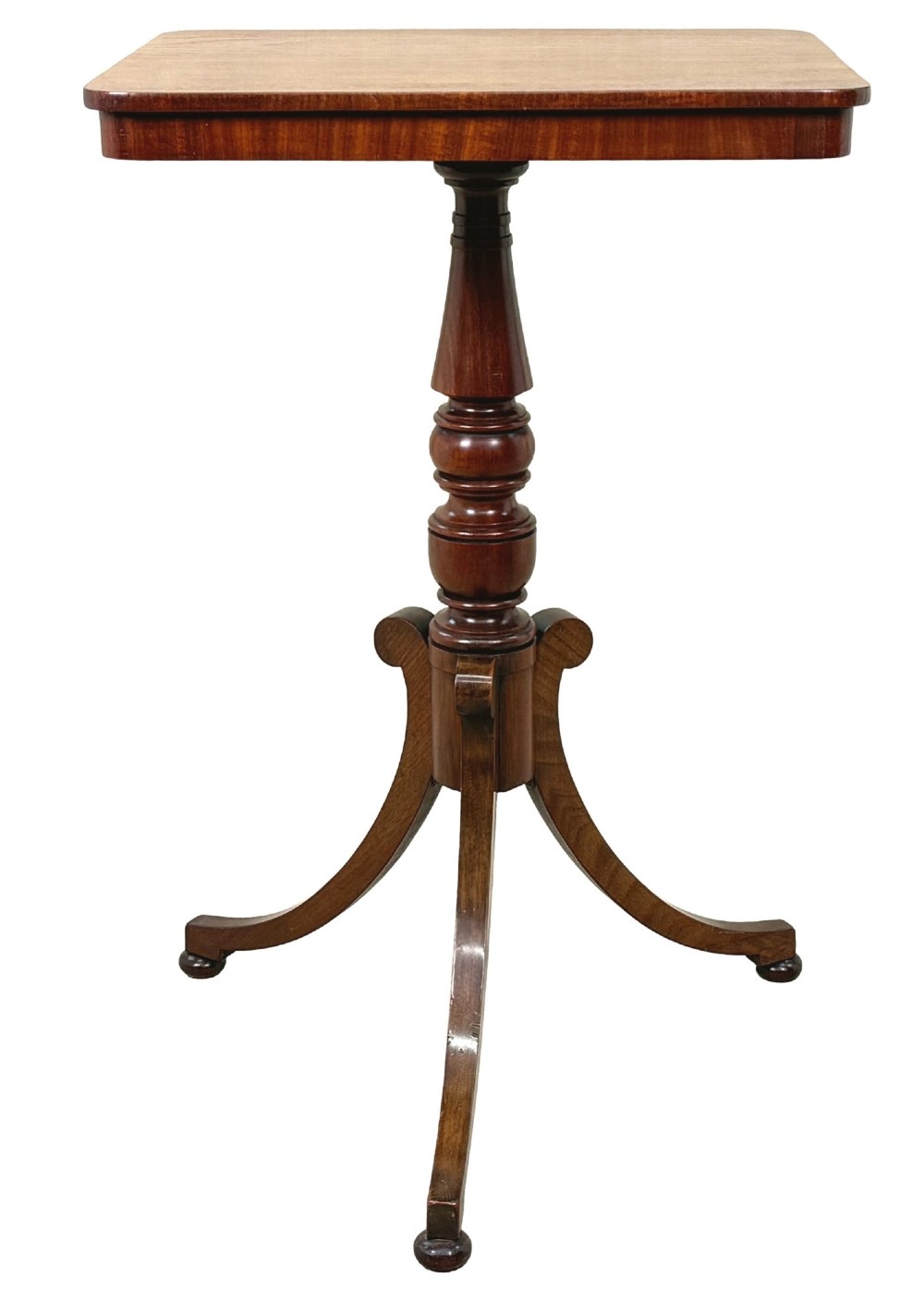 A Regency period mahogany wine table with a rectangular top, a turned central pedestal column, and three splayed legs ending in ball feet. View XII