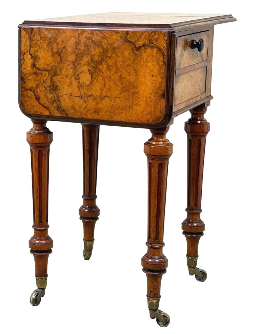A 19th-century burr walnut Pembroke side table with a single drawer, two drop-down side leaves, turned fluted legs, and brass castors. View VIII