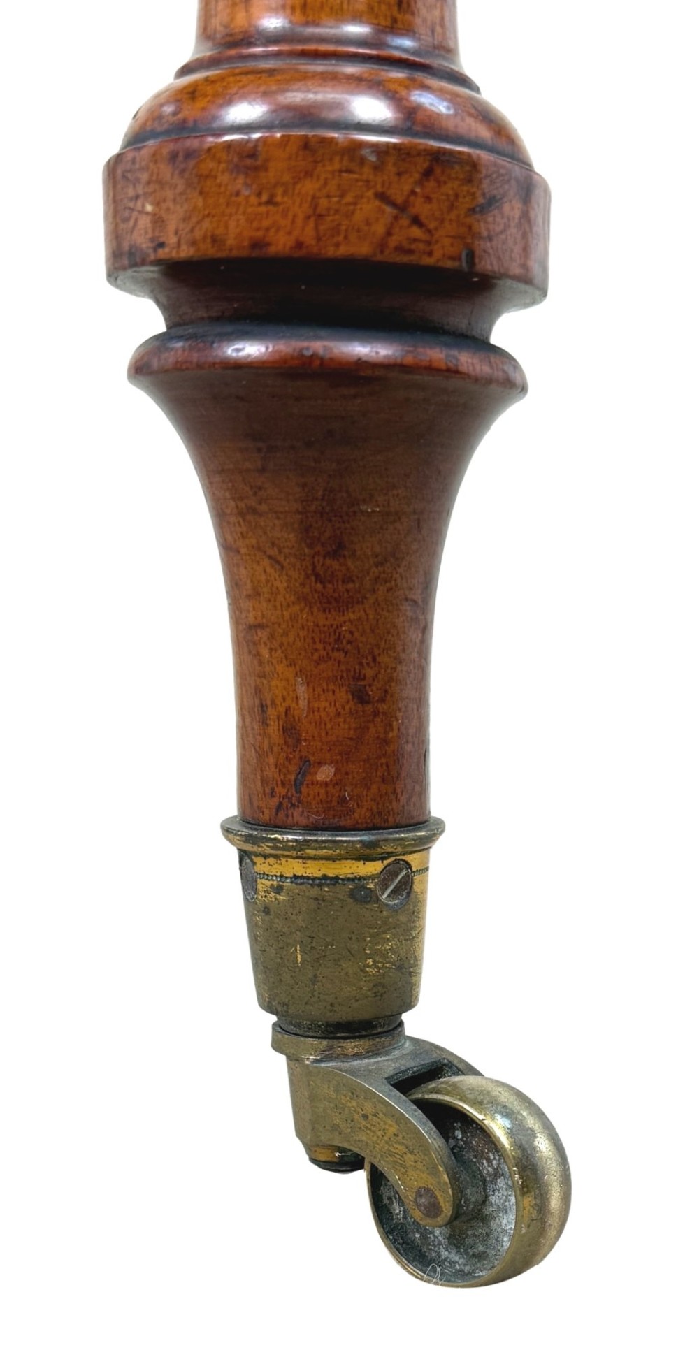 A 19th-century burr walnut Pembroke side table with a single drawer, two drop-down side leaves, turned fluted legs, and brass castors. View X
