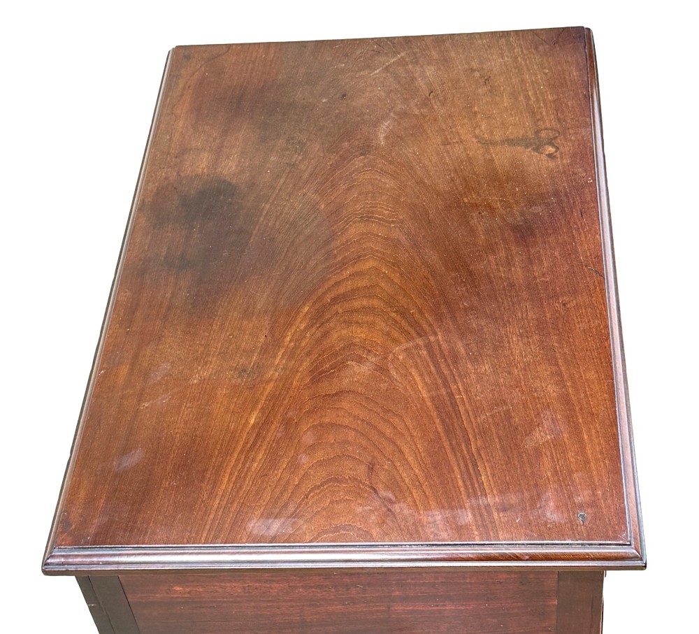 An early Georgian mahogany lowboy table featuring three drawers with brass handles, a shaped apron, and four cabriole legs. View III
