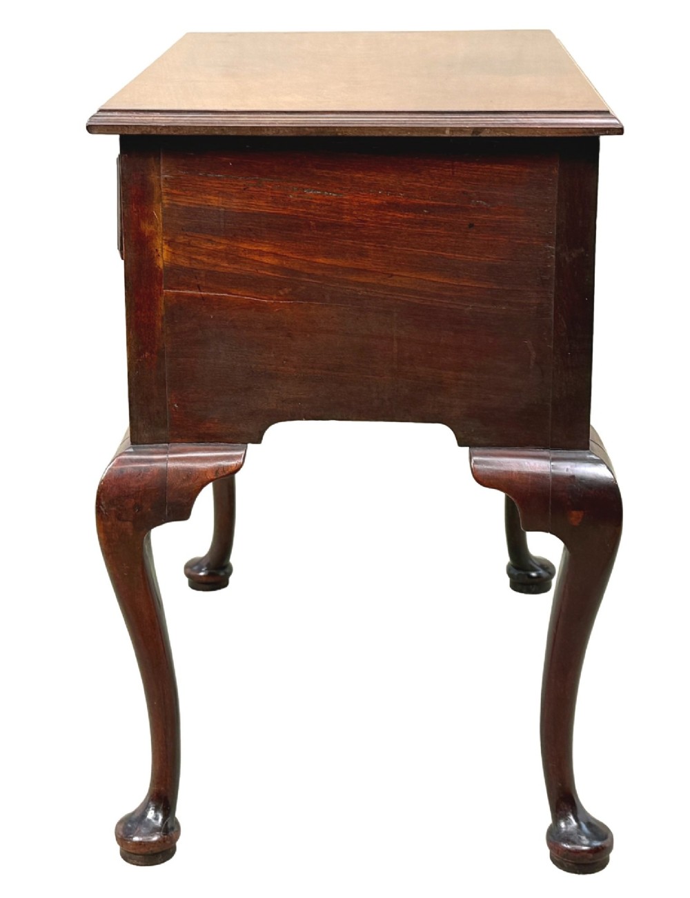 An early Georgian mahogany lowboy table featuring three drawers with brass handles, a shaped apron, and four cabriole legs. View VI