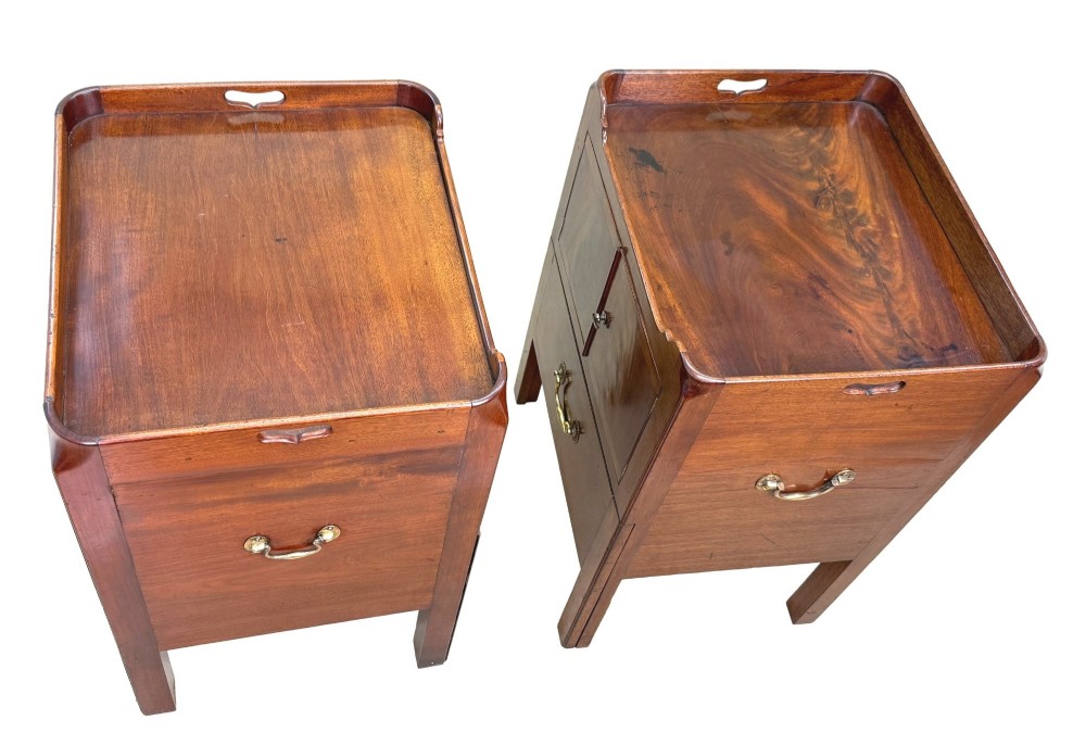A matched pair of Georgian mahogany bedside tables featuring top tray galleries with cutout handles, double cupboard doors, lower drawers, and brass hardware. View X