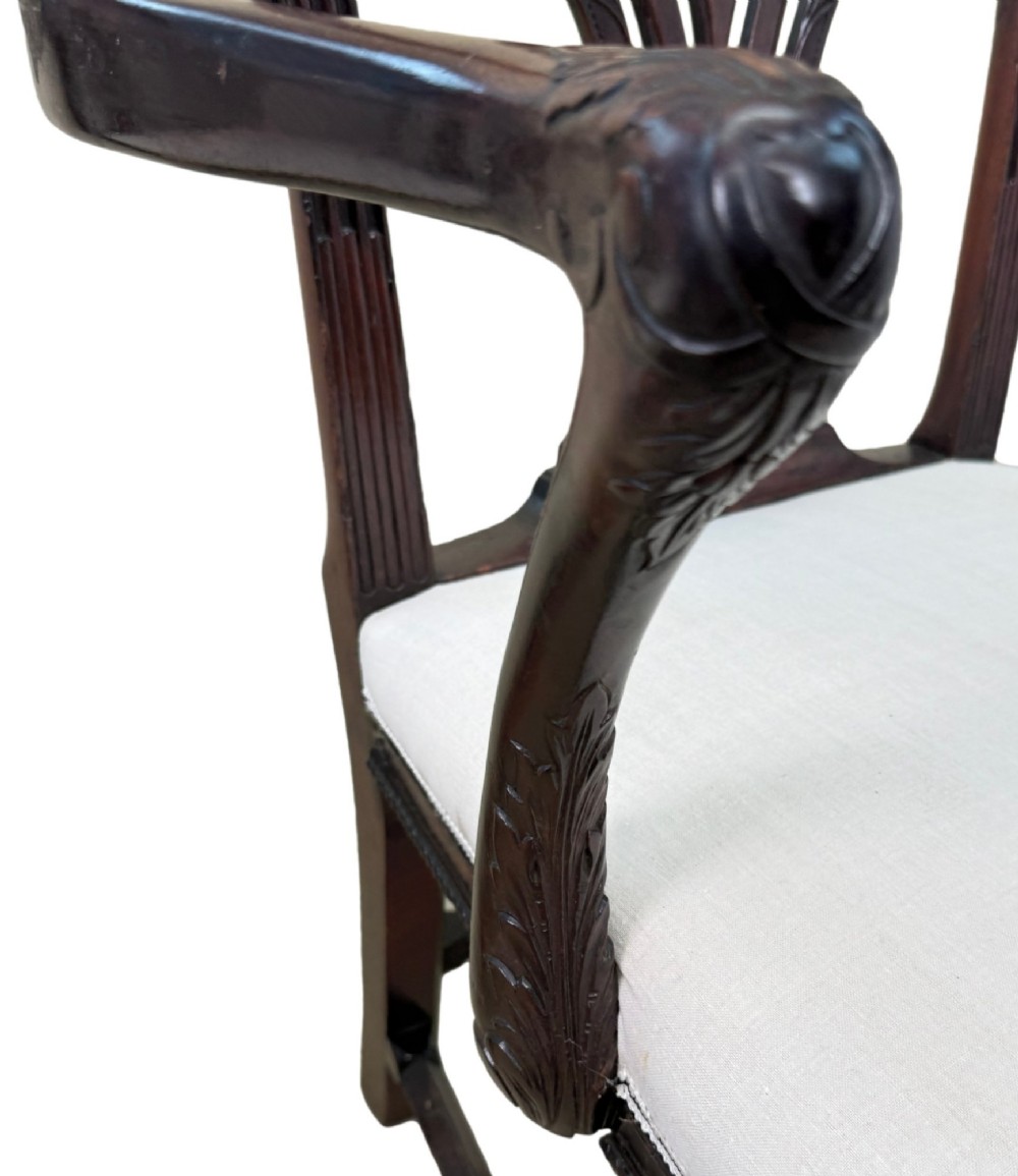 A pair of 18th-century Chippendale mahogany carver armchairs featuring intricately carved pierced back splats, curved arms, and neutral upholstered drop-in seats. View VI