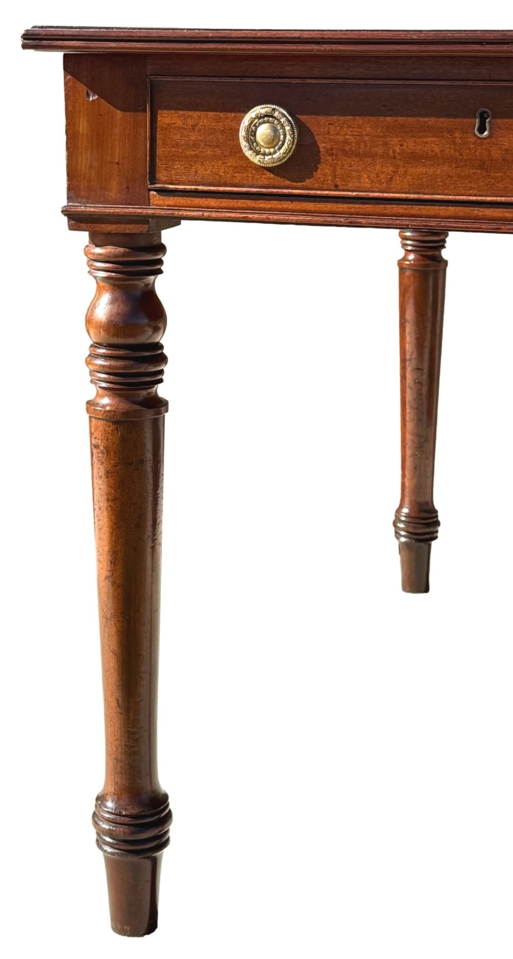 A large 19th-century Georgian mahogany partners writing table with frieze drawers, brass handles, turned legs, and a dark leather writing surface. View VIII
