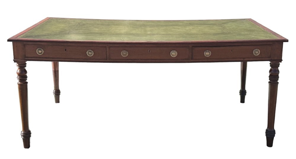 A large 19th-century Georgian mahogany partners writing table with frieze drawers, brass handles, turned legs, and a dark leather writing surface. View XIII