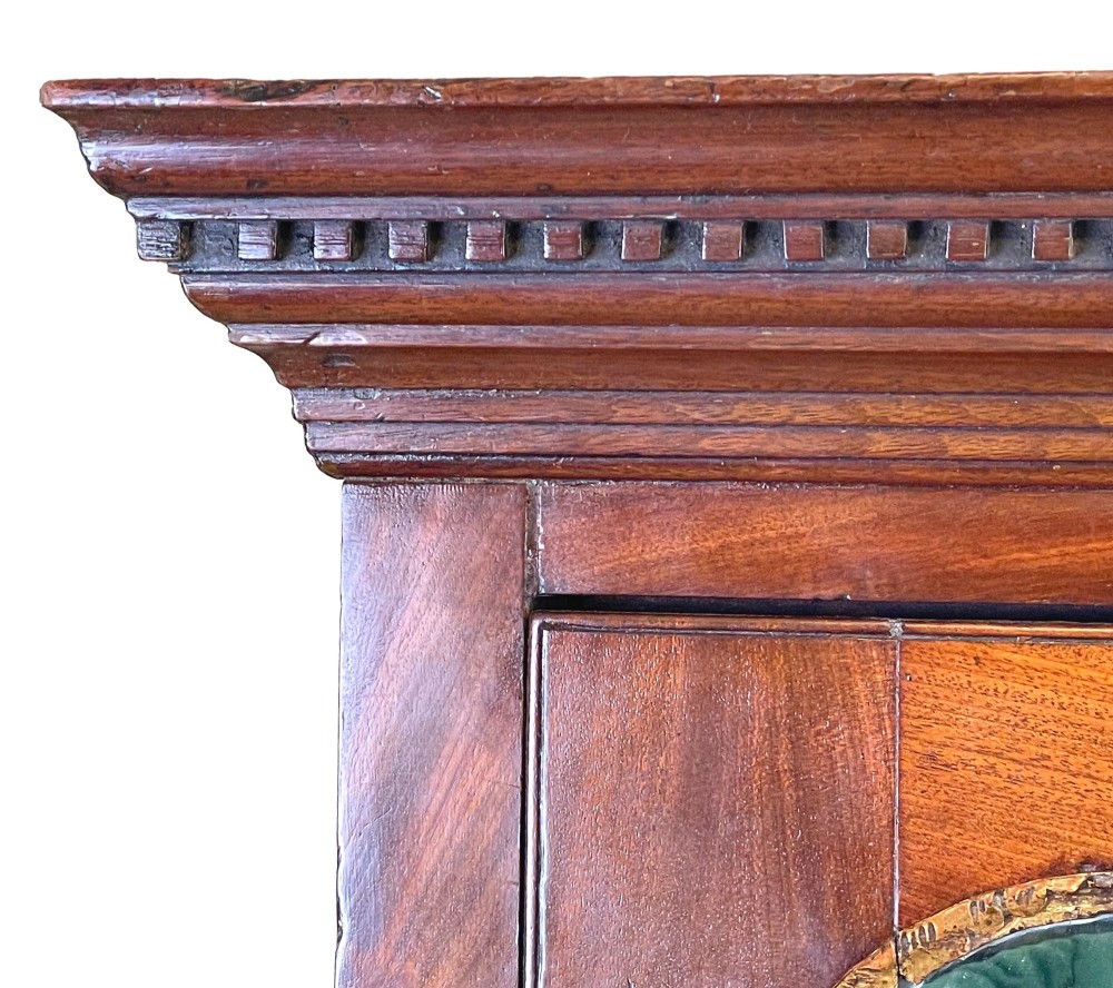 A Georgian mahogany bureau bookcase featuring an upper mirrored cabinet door above a slant-front desk and three lower drawers. View VIII