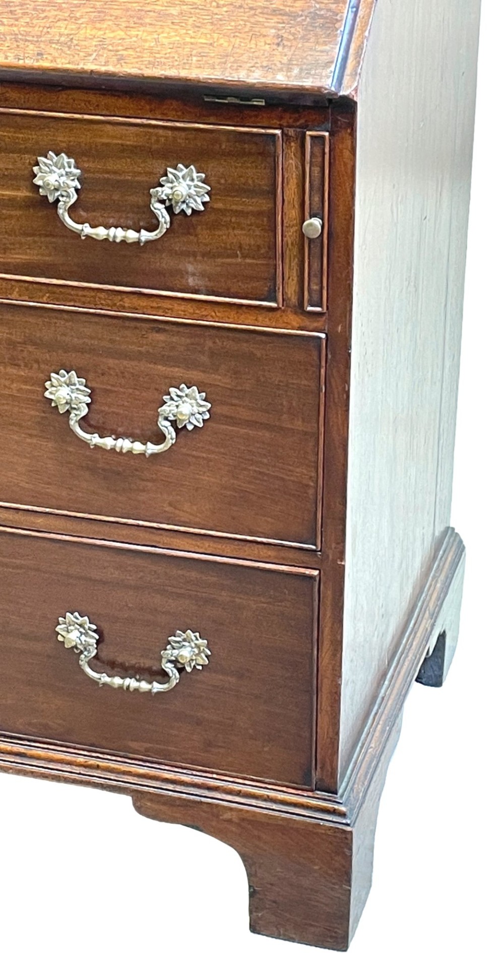 A Georgian mahogany bureau bookcase featuring an upper mirrored cabinet door above a slant-front desk and three lower drawers. View XI