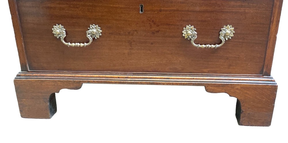 A Georgian mahogany bureau bookcase featuring an upper mirrored cabinet door above a slant-front desk and three lower drawers. View XIII