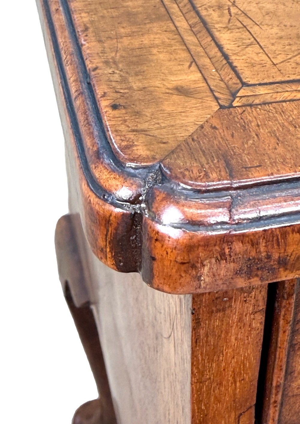 An early 18th-century George I walnut lowboy with four drawers, brass drop handles, a shaped apron, and cabriole legs with pad feet. View VII