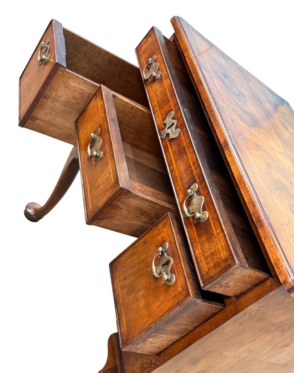 An early 18th-century George I walnut lowboy with four drawers, brass drop handles, a shaped apron, and cabriole legs with pad feet. View VIII