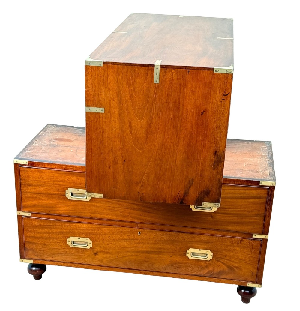 A mid-19th century camphor wood military campaign chest of drawers featuring brass corner brackets, flush handles, and two separate stacking sections on turned feet. View XIV