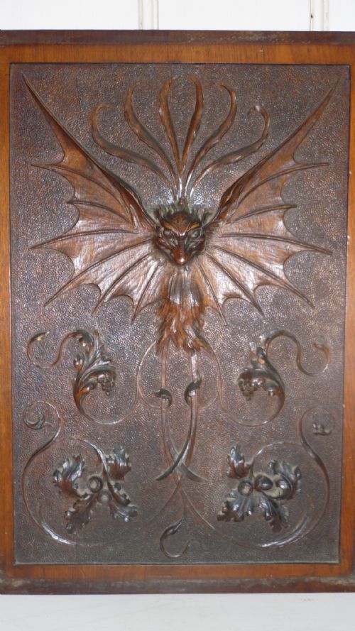 19th Century Carved Walnut Bat Panel