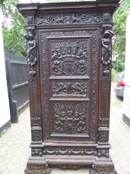 19th Century Carved Oak Cabinet Armoire Caryatids Lions Griffins.