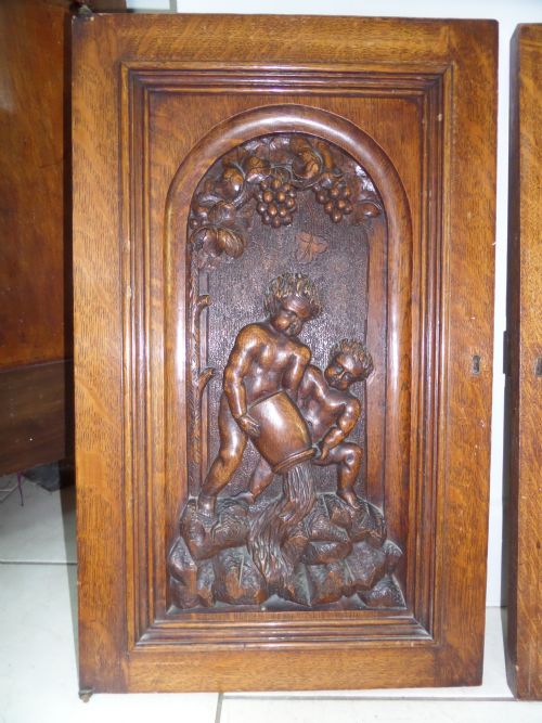 19th Century Carved Oak Cherub Panel in a Vinyard