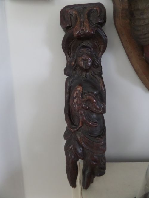 17th Century Carved Oak Caryatid Holding Eagle Panel