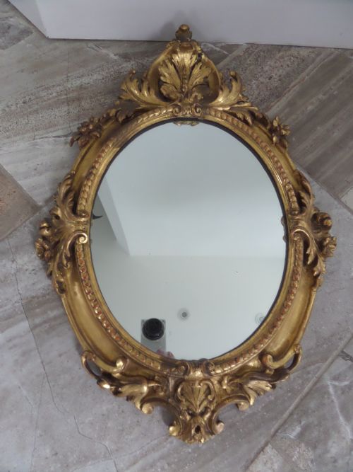 19th Century Carved Wooden Rococo Acanthus Green Man Mirror