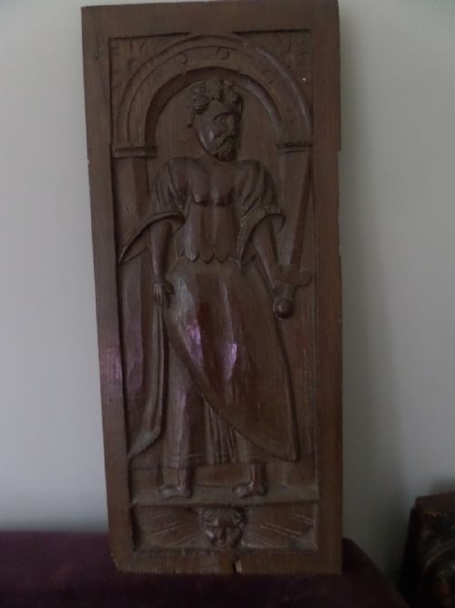 16th Century Carved Oak Saint with Decapitated Winged Angel Putto Panel