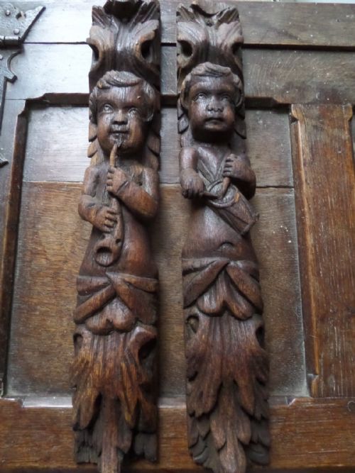 19th Century Carved Oak Caryatids Playing a Musical Instrument