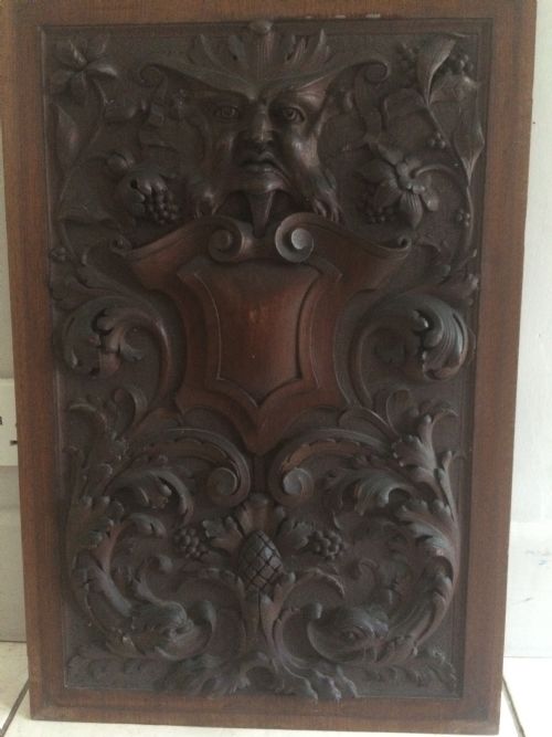 19th Century Carved Walnut Panel Horned Devil, Dolphins and Lion Claw Feet