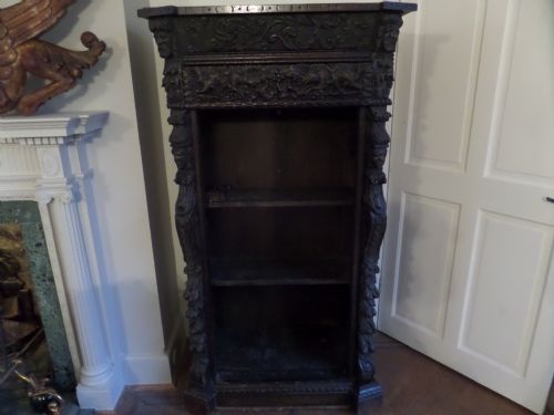 19th Century Heavily Carved Oak Bookcase with Carved Hunting Dogs.